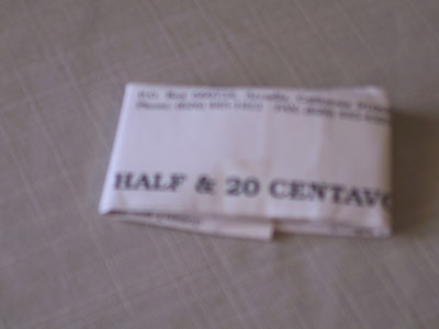 johnson's half dollar and 20 centavo